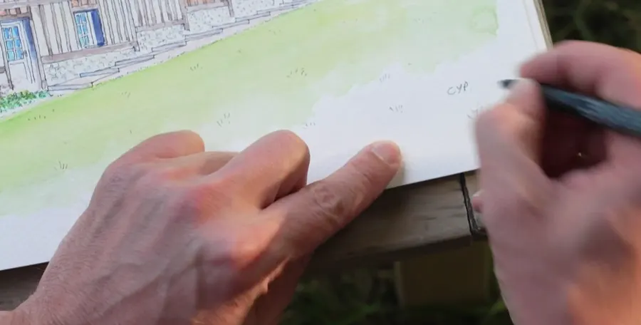 Au bas de l’aquarelle, dans le vert de la pelouse, Cyp signe son dessin de trois lettres